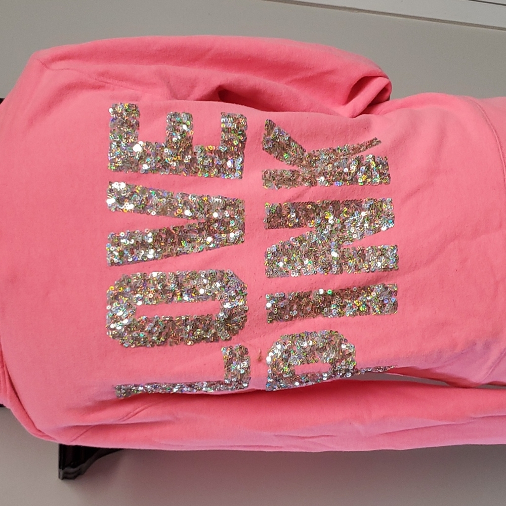 Victoria's secrets pink neon neon zip-up sweater bling on the back love pink.